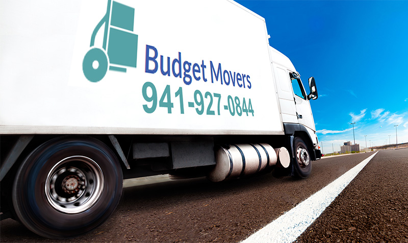 Sarasota, Venice, Bradenton areas best long distance moving company's truck with Budget Movers contact information